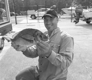 Andrew Buresch from Belmont with a 1.8kg Swansea Channel bream caught on a pumpkinseed 3